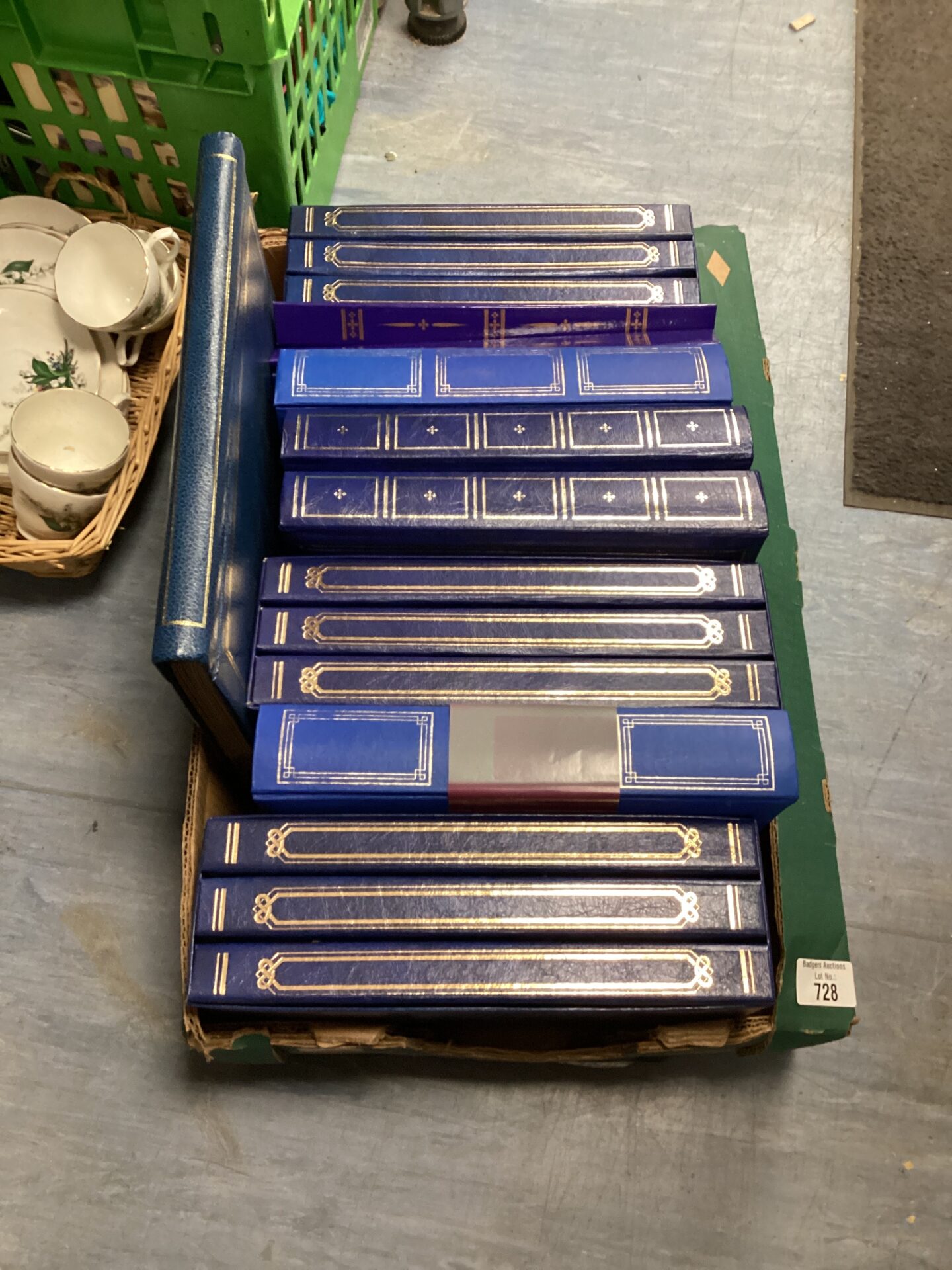 728 Box of blue leather bound photo albums