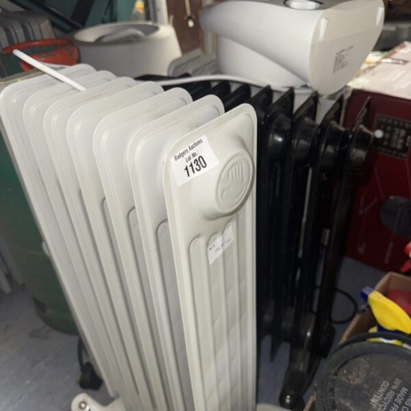 Lot of three oil filled radiators and one fan heater.