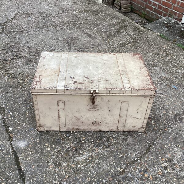 Vintage metal storage chest with aged patina.