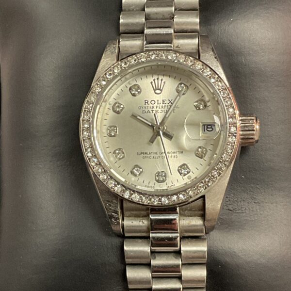 Gold-tone Rolex style ladies wristwatch with automatic movement.