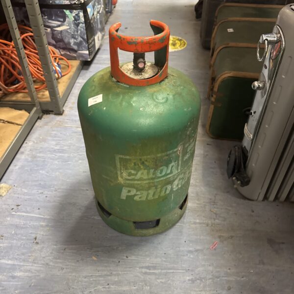 Green Calor gas canister with valve, used for patio heaters.