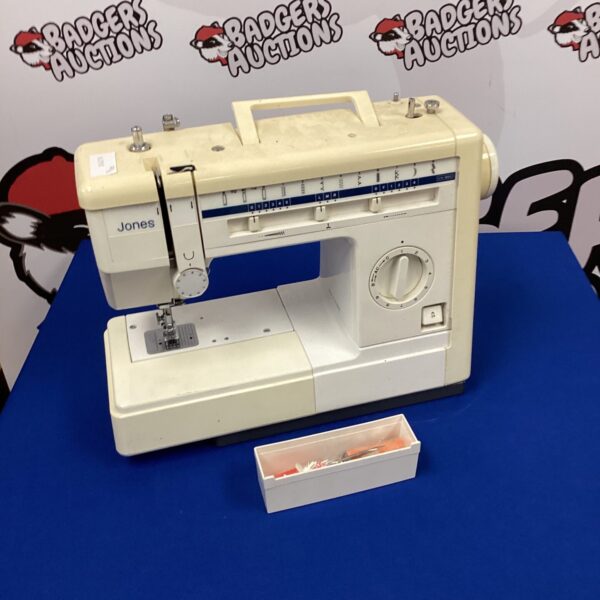 Vintage Jones electric sewing machine in good condition.
