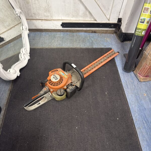 Used Stihl HS45 petrol hedge cutter for garden maintenance.