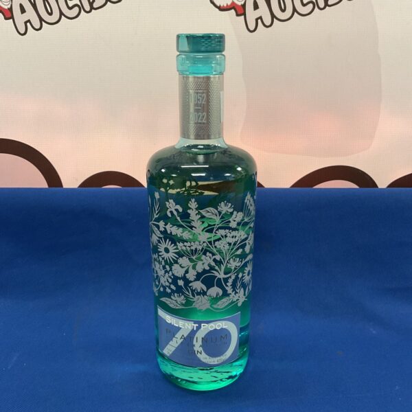 Limited edition Silent Pool Platinum Gin bottle with floral design.