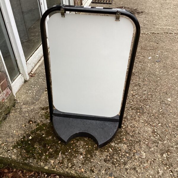 Black and white shop swing board for outdoor display.