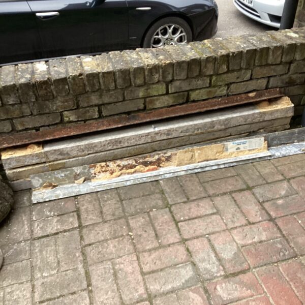 Reclaimed steel builders lintels showing signs of corrosion.