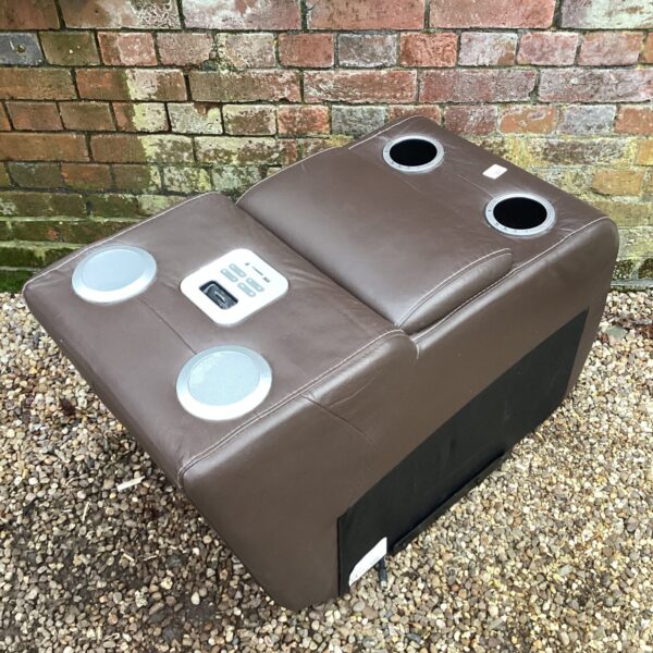 Brown leather Iwave console with drink holders and iPod dock.