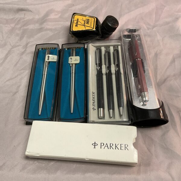 Vintage Parker pens and bottle of Indian ink for collectors.