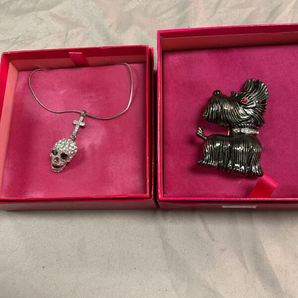 Butler and Wilson vintage Scottie dog brooch and skull necklace set.