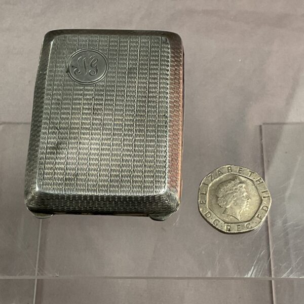 Antique sterling silver vesta case with engraved initials.