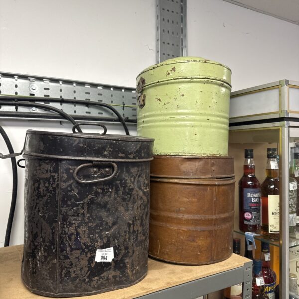 Lot of three vintage tin hat boxes with patina.