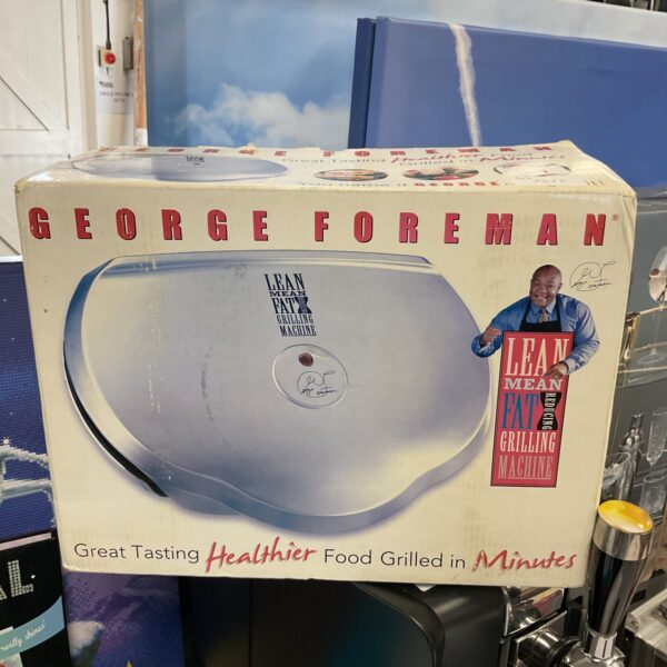 Vintage George Foreman Lean Mean Grilling Machine packaging.