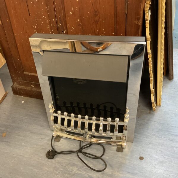 Modern stainless steel electric fireplace for indoor heating and ambiance.