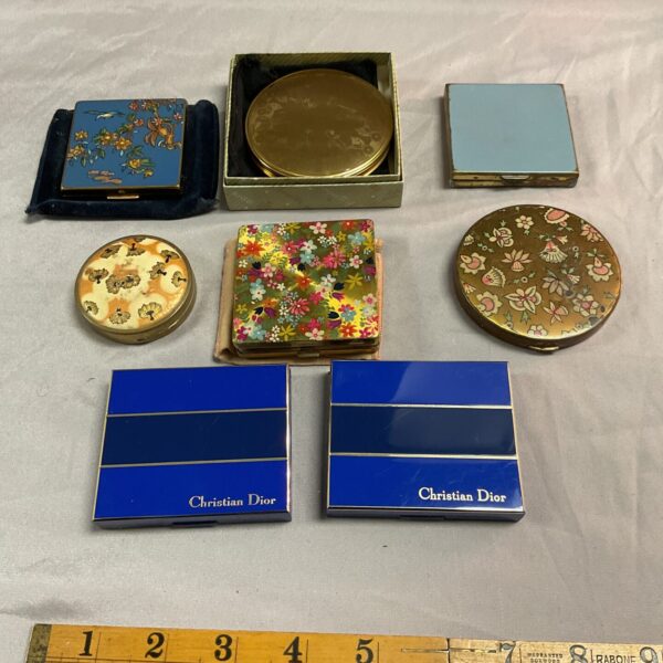 Vintage compacts lot including Christian Dior, a colourful collection.