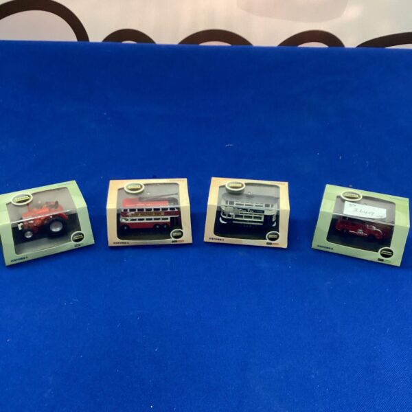 Lot of four Oxford Diecast model cars in boxes.