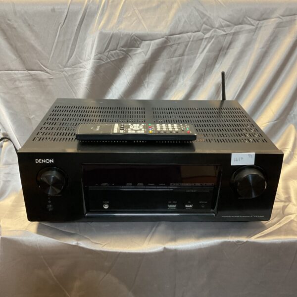 Black Denon XT300W network AV receiver for home theater setup.