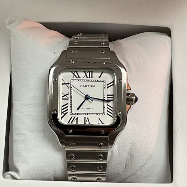 Front view of a Cartier style automatic wristwatch with a white dial.