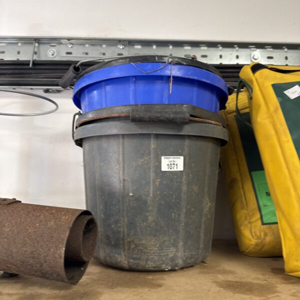 Assorted plastic buckets in a mixed lot, showing signs of use.