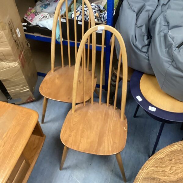 Vintage Ercol Quaker dining chairs in beechwood, mid-century style.
