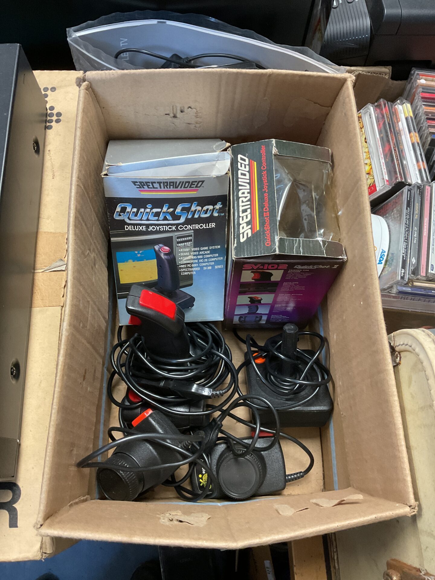 193 Box of atari joysticks & paddles