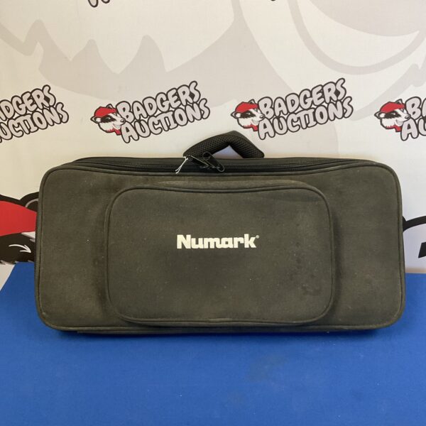 Front view of a black Numark DJ controller bag with a zipper.