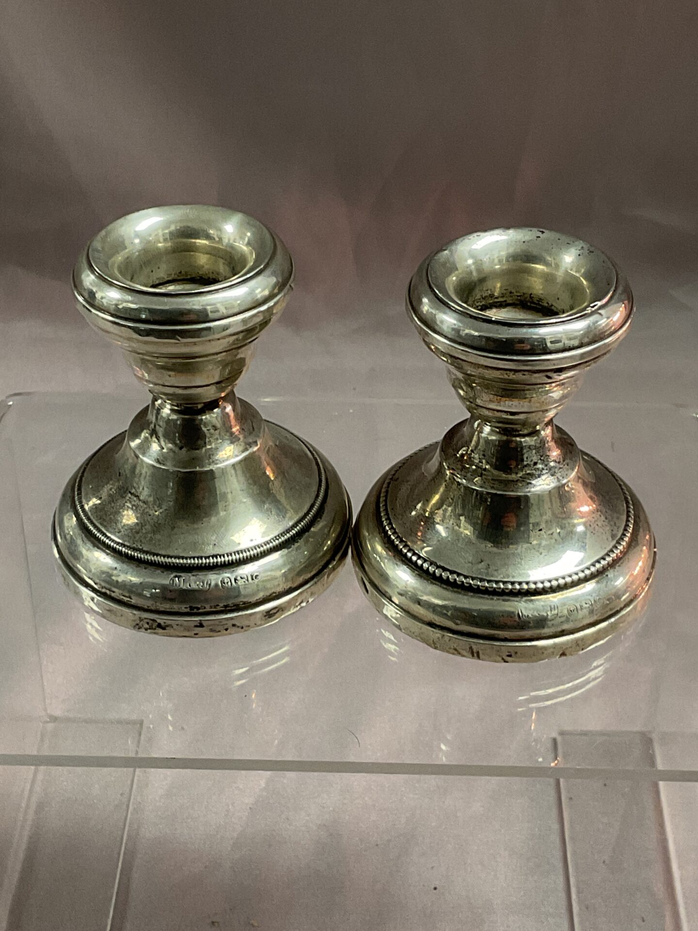 973 Pair of hallmarked Sterling Silver weighted candle sticks
