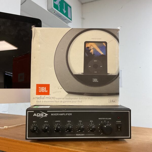 Vintage Ads Worldwide mixer amplifier with JBL Radial Micro iPod dock.