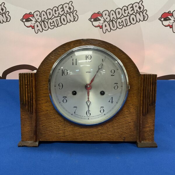 Vintage Duponic art deco mantle clock with cream dial and black numerals.