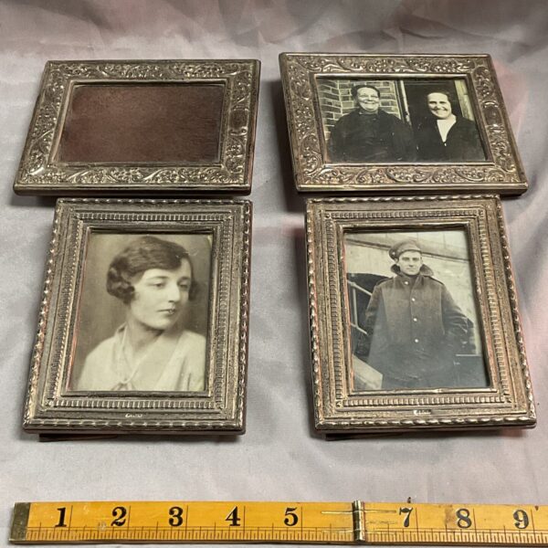 Lot of four antique silver photo frames, Edwardian style.