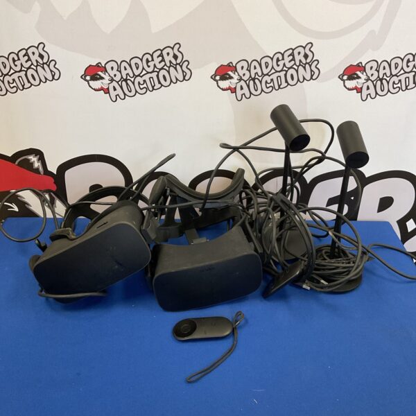 Pair of used Oculus Rift VR headsets for virtual reality gaming.