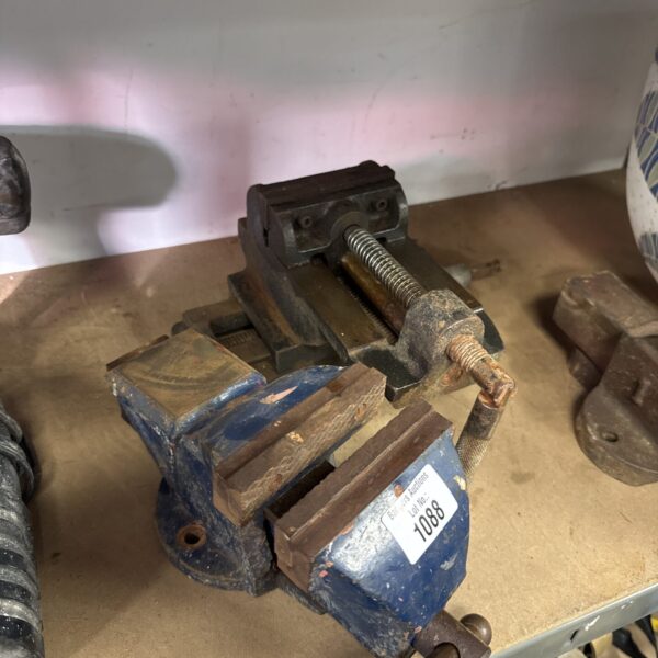 Small Clarke bench vice for metalworking and workshop use.