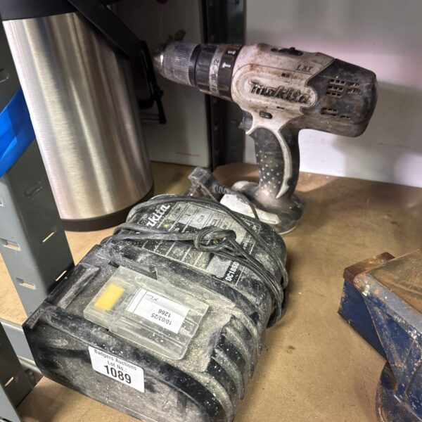 Makita LXT cordless drill in used condition, power tool for DIY.