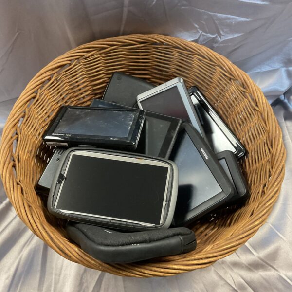 Bundle of Garmin and TomTom sat navs for car navigation.