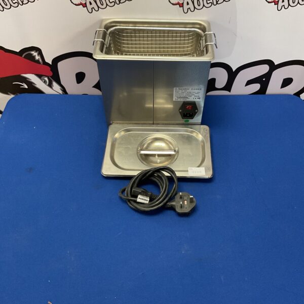 Digital ultrasonic cleaner with stainless steel tank and digital display.