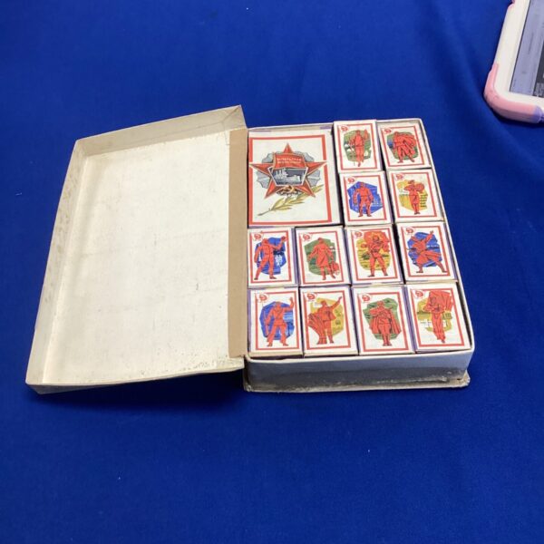 Vintage Russian matchboxes with colourful designs, collectible Soviet ephemera.