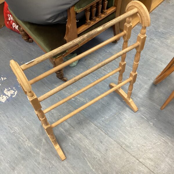Vintage wooden towel rail for bathroom or kitchen use.