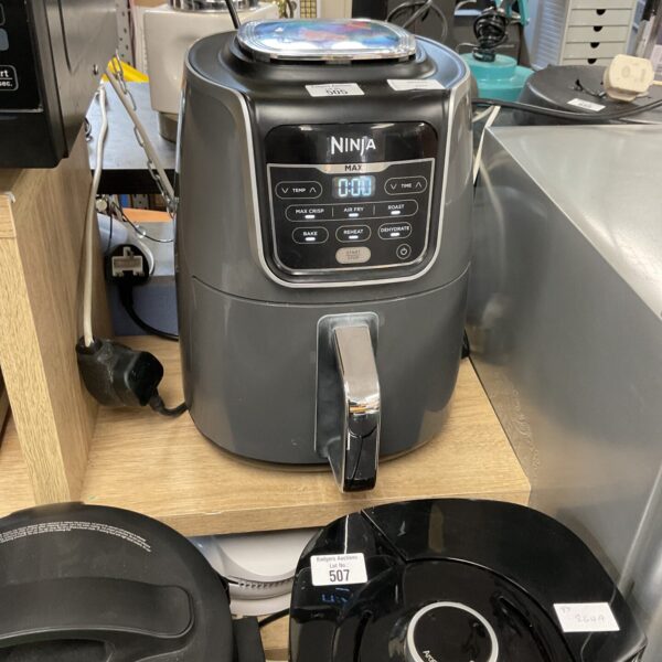 Ninja Air Fryer Max XL digital kitchen appliance for quick cooking.