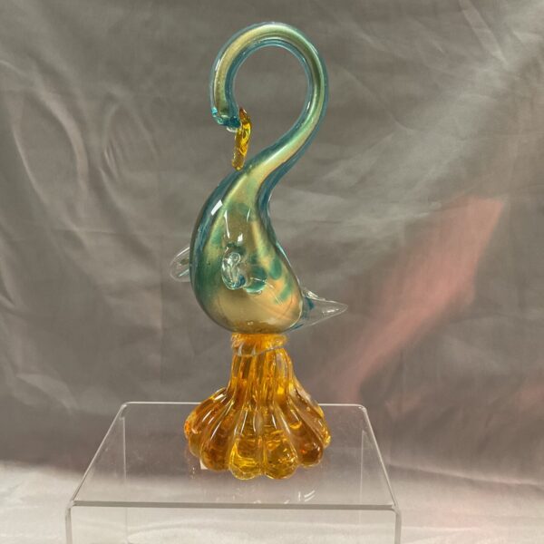 Elegant Murano glass swan sculpture with amber and teal coloring.