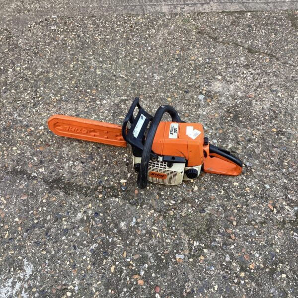Vintage Stihl 021 chainsaw in used condition.