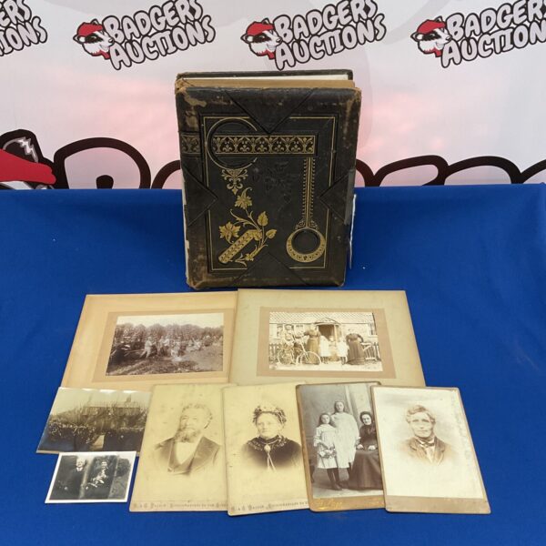 Antique Victorian photo album with embossed leather cover.