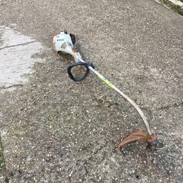 Stihl FS45 petrol strimmer for garden maintenance and landscaping.