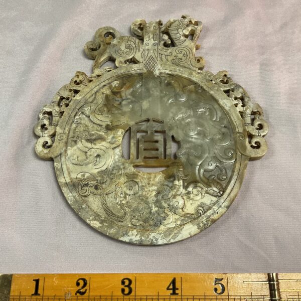 Antique Chinese soapstone plaque with detailed dragon carving.