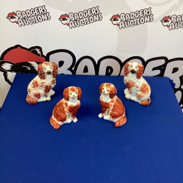 Antique Staffordshire spaniels figurines, Victorian pottery dogs.