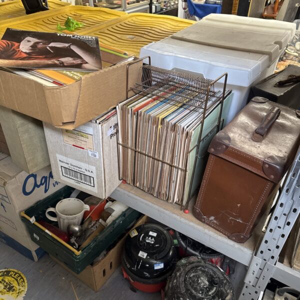 Assorted vinyl records including Tom Jones and classical music.