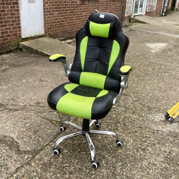 Black and green gaming chair with adjustable features for comfortable gaming.