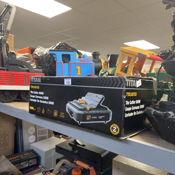 Titan ttb336tcb electric tile cutter in box.