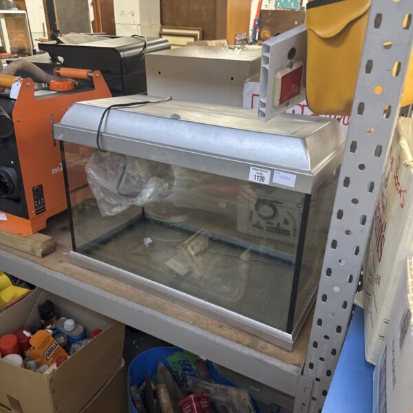 Side view of a rectangular fish tank with integrated light.