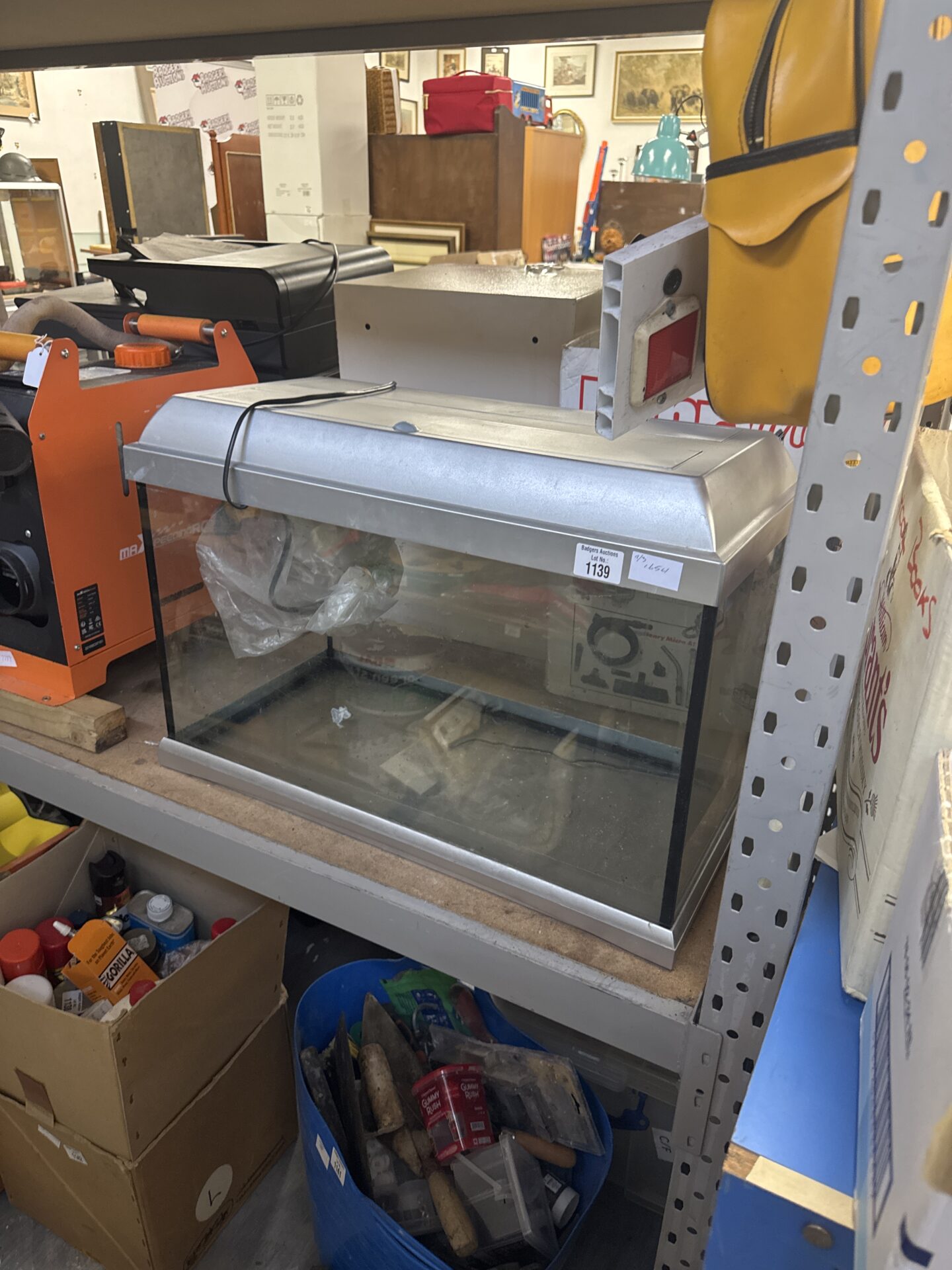 1139 Fish tank with lighting 23.5” length approx