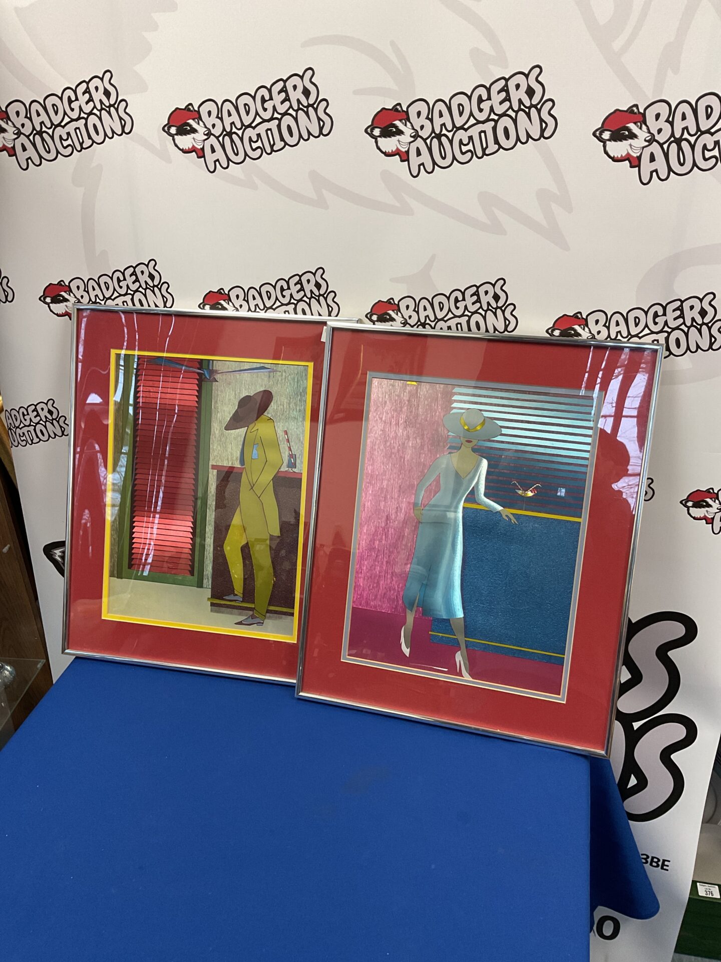 777 Pair of framed metallic prints of 1950s characters