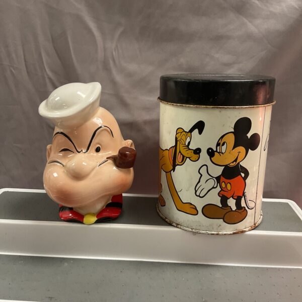 Vintage ceramic popeye money box and Mickey Mouse tin